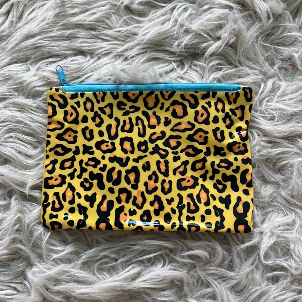 small plastic leopard print makeup bag
